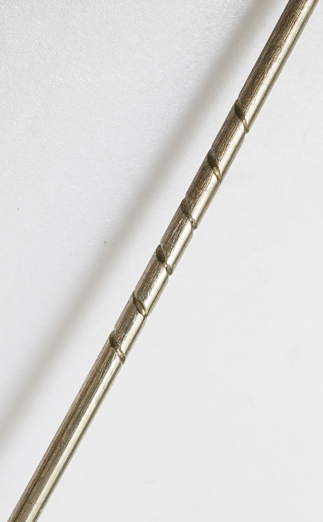 A citrine brooch and pendant, and onyx stickpin